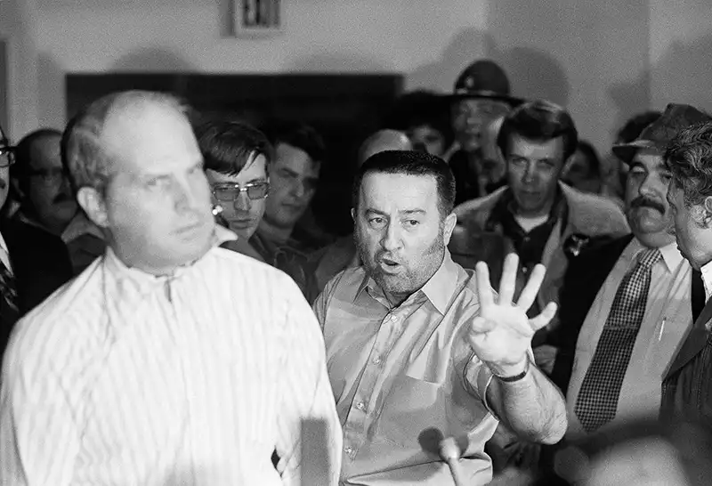 Tony Kiritsis with Richard Hall talking to cameras